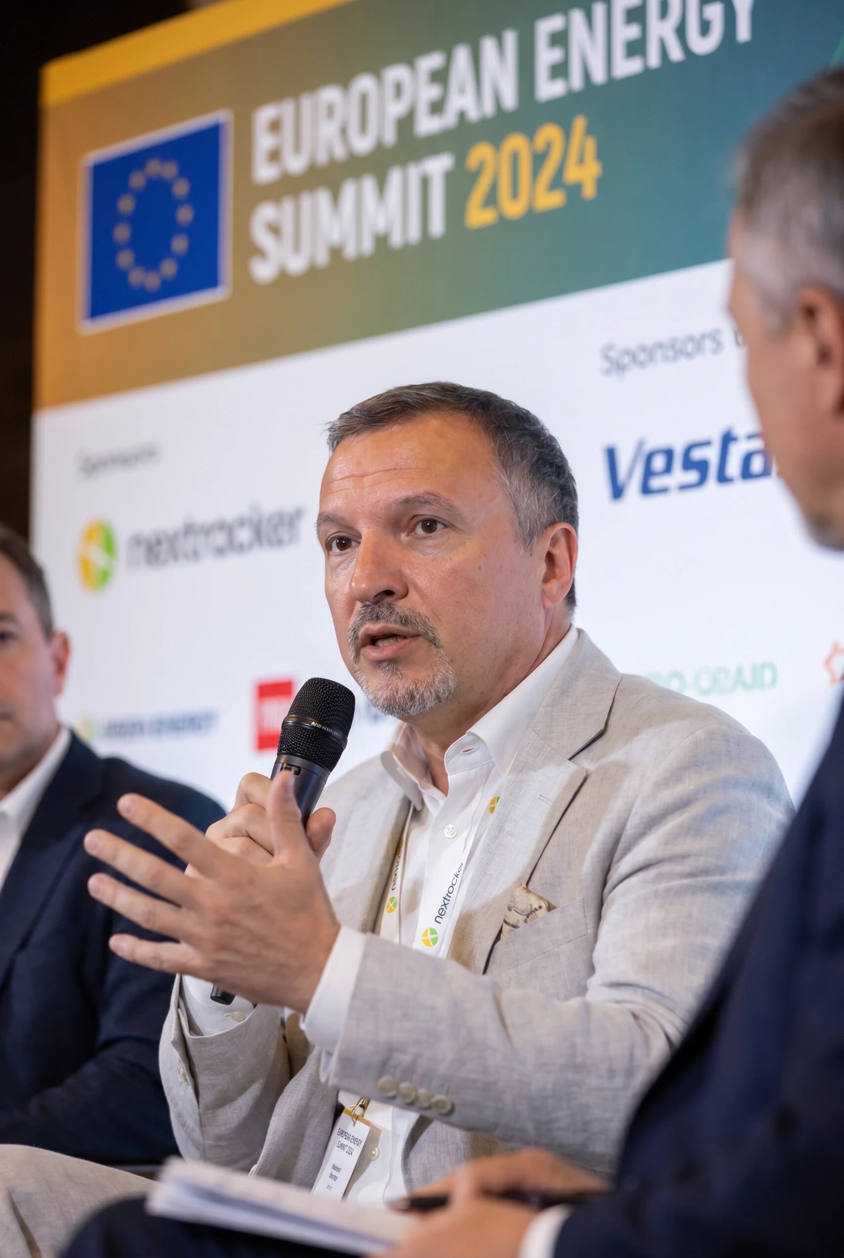Radu Eremciuc speaking on a panel at the European Energy Summit 2024
